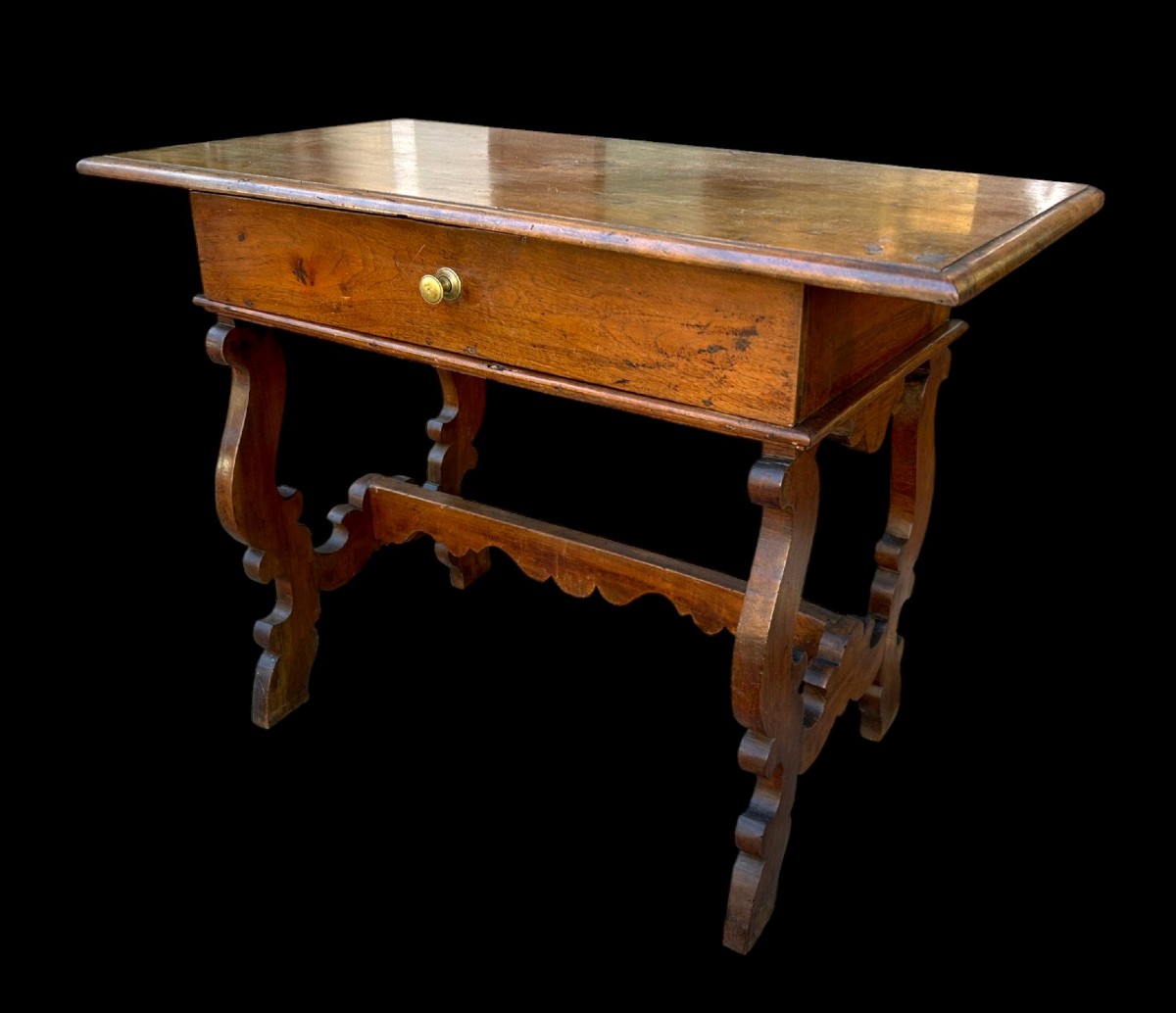 A late 17th-century lyre-shaped writing table. Northern Italy.