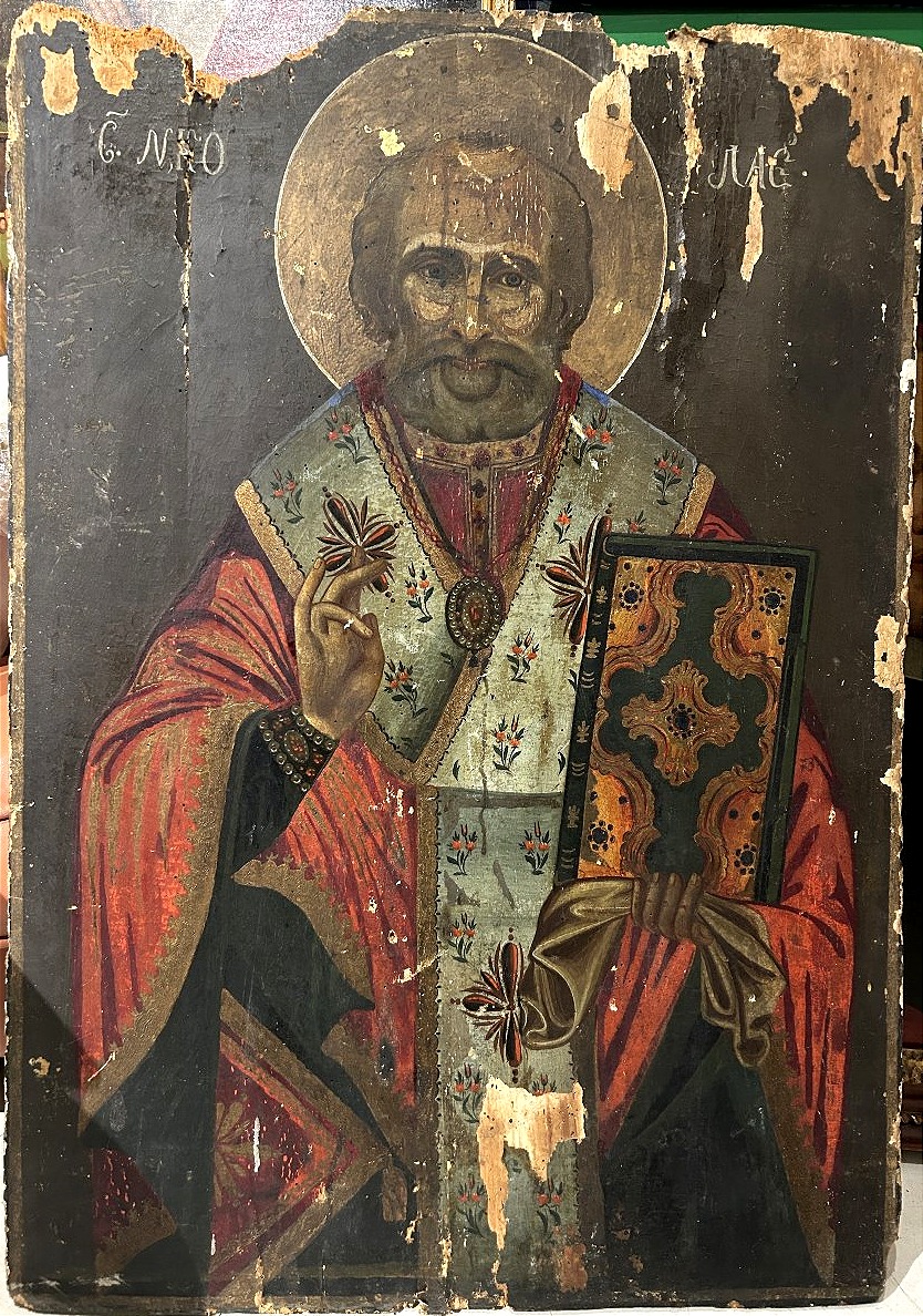Grande icône orthodoxe sur bois représentant saint Nicolas, à restaurer. (67 cm x 95 cm)