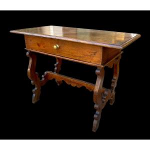 A late 17th-century lyre-shaped writing table. Northern Italy.