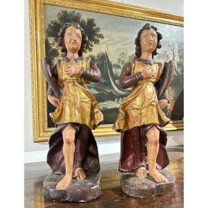 Pair Of Wooden Sculptures Depicting Allegorical Figures Holding A Cornucopia. Italy, 17th Century.