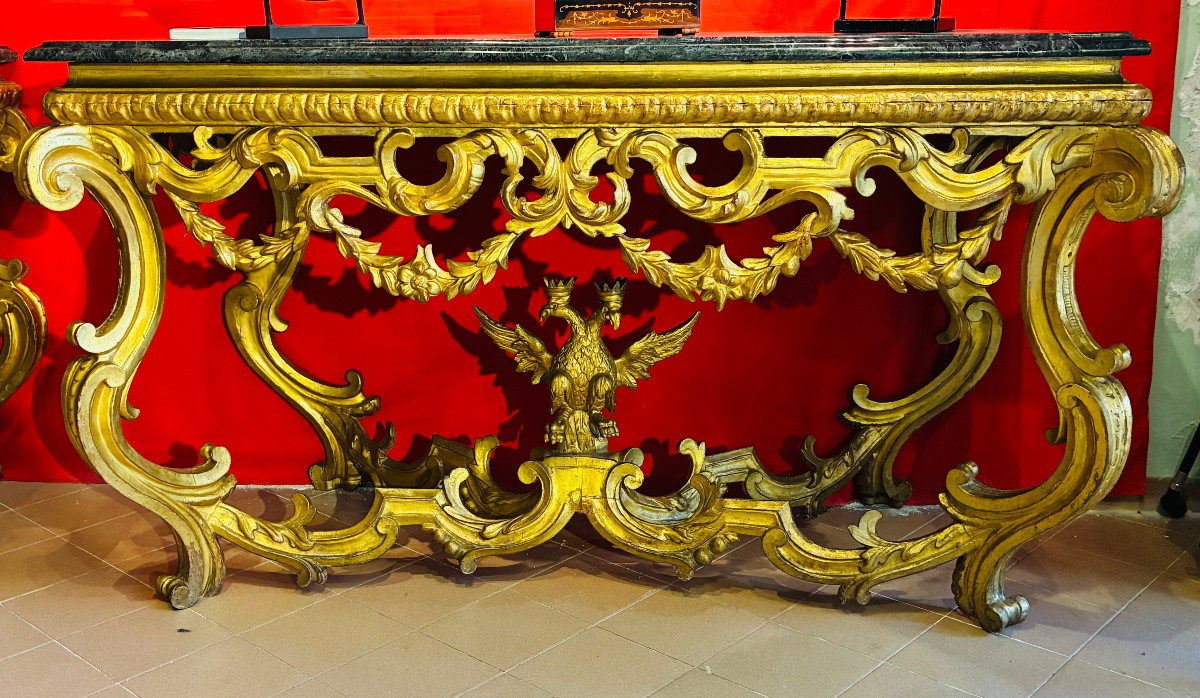 Paire de consoles en bois doré d'Émilie-Romagne, à plateau en marbre, début du XVIIIe siècle
