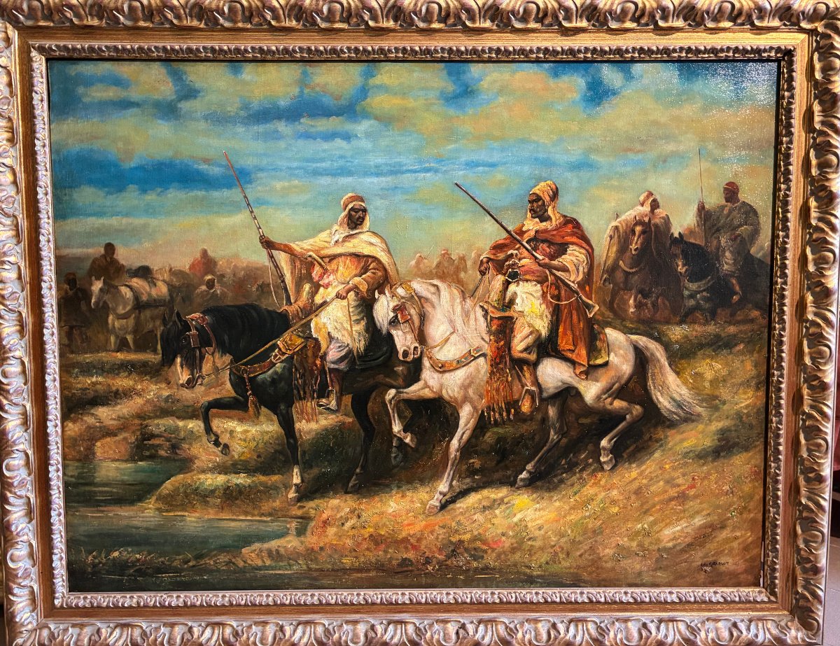 An Orientalist Painting Depicting Men On Horseback, Late 19th Century