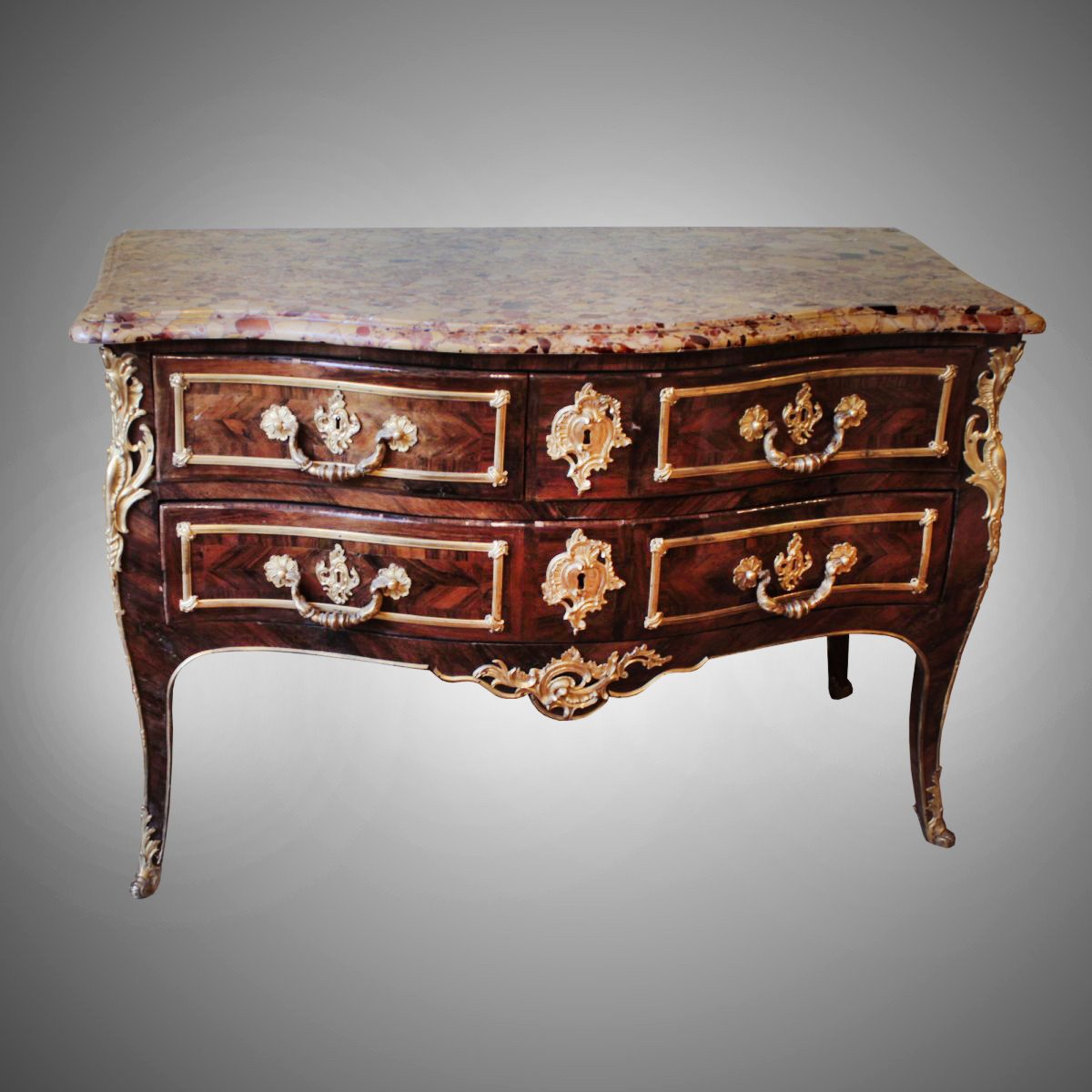 An Antique Louis XV Chest Of Drawers
