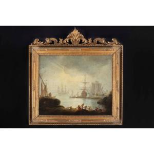 View Of A Harbor With Galleons And Fishermen