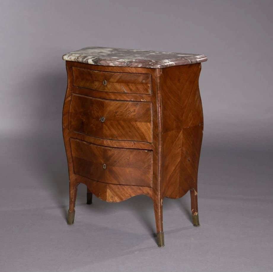 Central Bombé Chest Of Drawers In Bois De Rose With A Pink Breccia Marble Top.