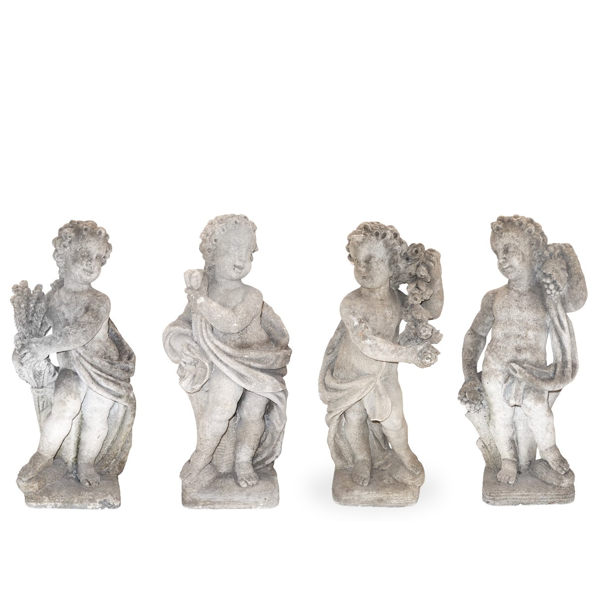 A Group Of Four Limestone Putti Depicting The Four Seasons, Late 19th Century