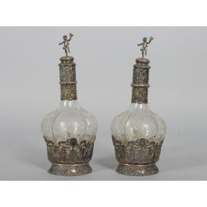 Paire de carafes en cristal taillé avec monture en argent 800‰