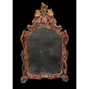 Venetian Mirror In Lacquered And Gilded Wood.