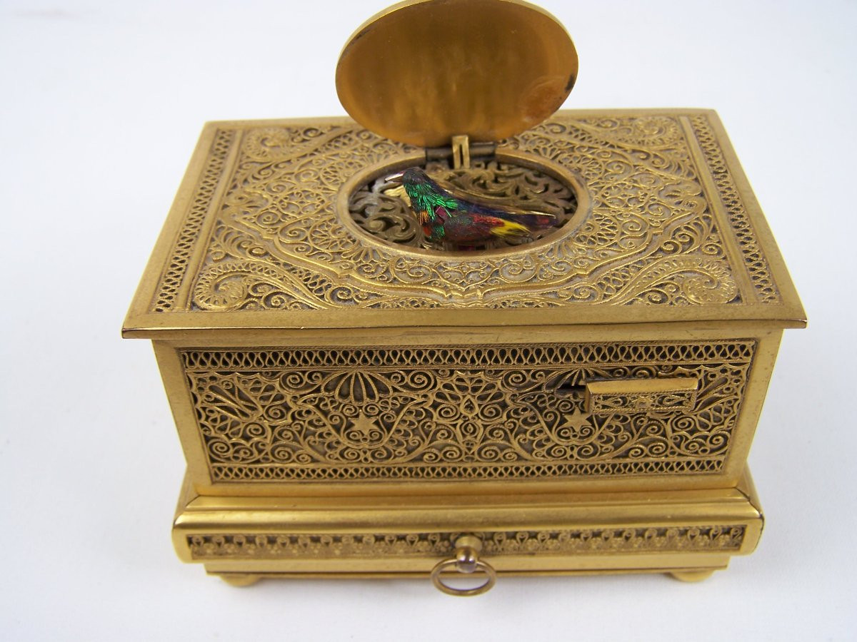 Oiseau chanteur de Griesbaum avec tirroir-photo-4