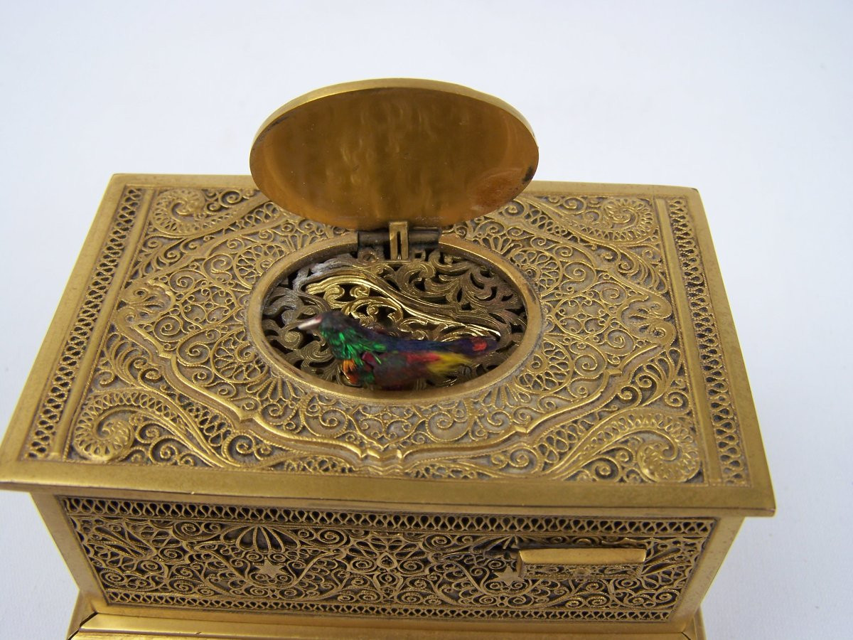 Oiseau chanteur de Griesbaum avec tirroir-photo-8