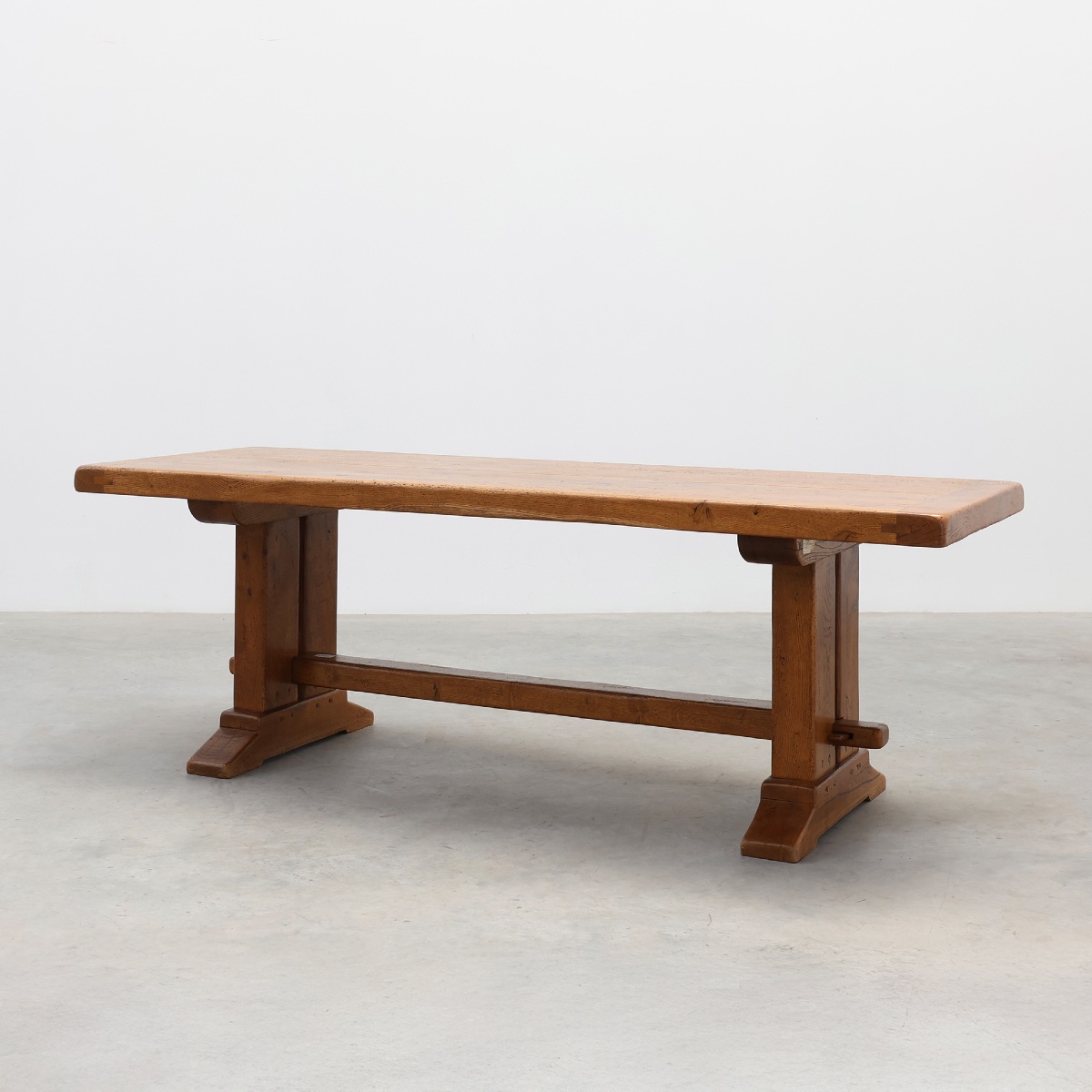 Solid oak trestle table with pegged stretcher, France, 20th century