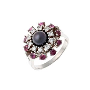 Bague « Fleur » en or blanc 14k avec diamants et rubis
