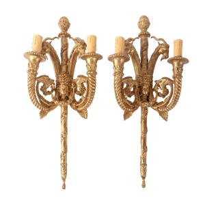 Serie de 4 appliques en bois sculpte et dore de style empire