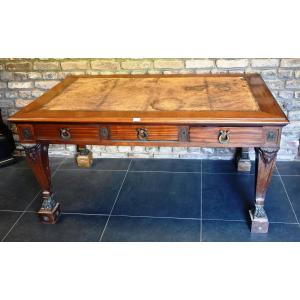 Bureau plat double face de style empire en acajou. 