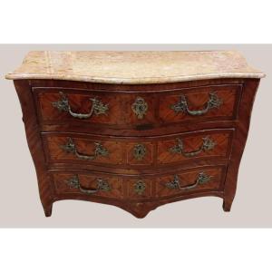 Commode tombeau en placage de bois exotique