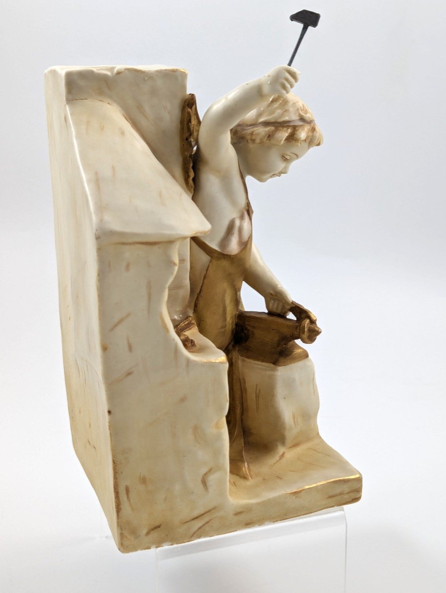 Porcelain Figure Of Cupid As A Blacksmith, Wahliss Teplitz Turn Vienna, Hand-painted And Gilded-photo-1