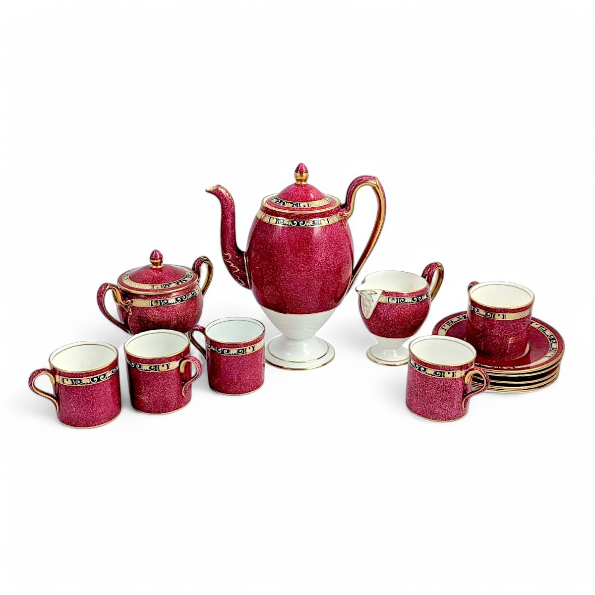 Rare service à café Wedgwood pour Hardy Brothers, porcelaine grenat et or, vers 1905
