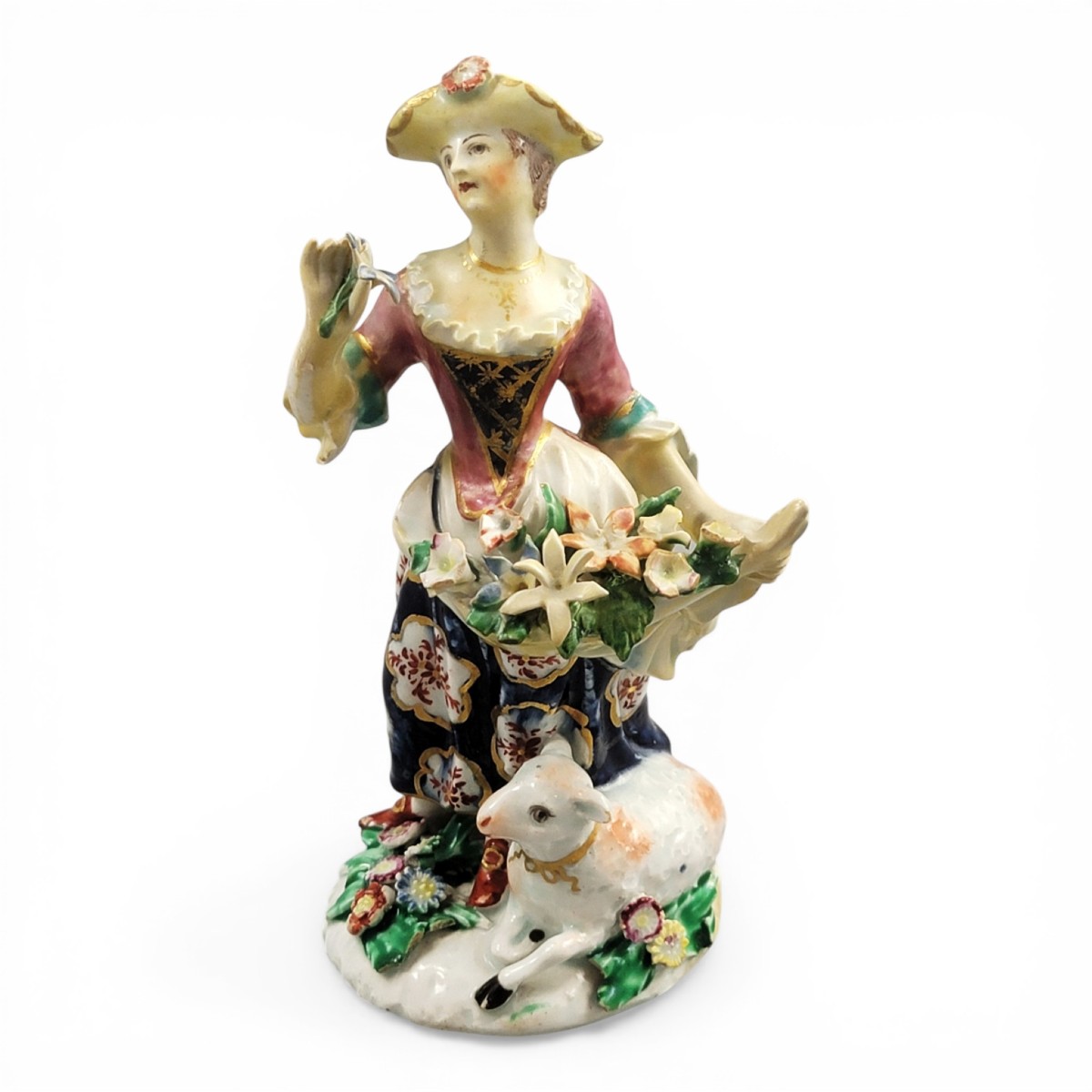 Figurine en porcelaine de Bow représentant une dame avec agneau et fleurs, vers 1760