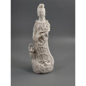 Dehua Blanc De Chine Guanyin With Fish Basket, Early 20th Century