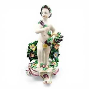 Figure en porcelaine de Bow représentant un putto bachique, vers 1760