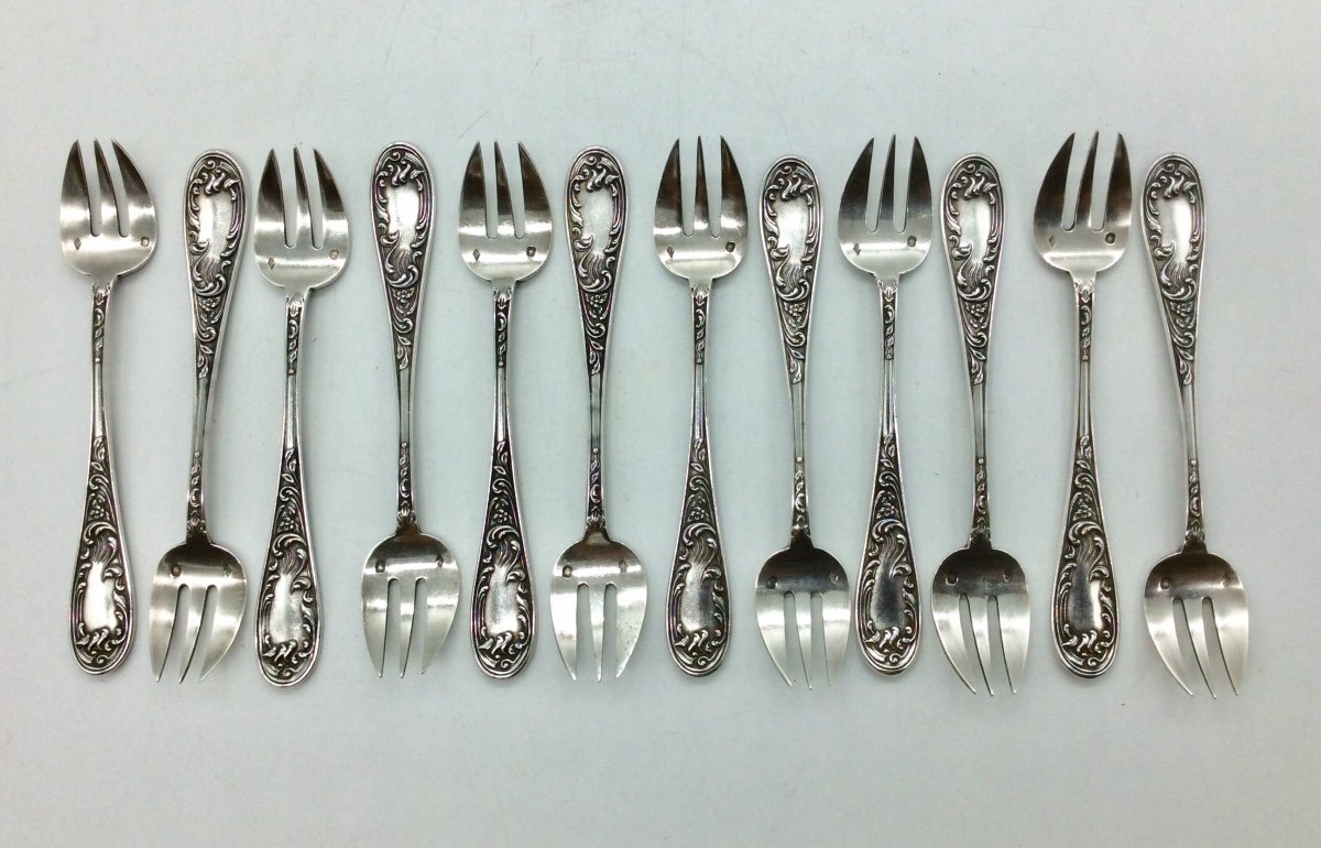 Series Of 12 Oyster Forks, Silver Minerva.