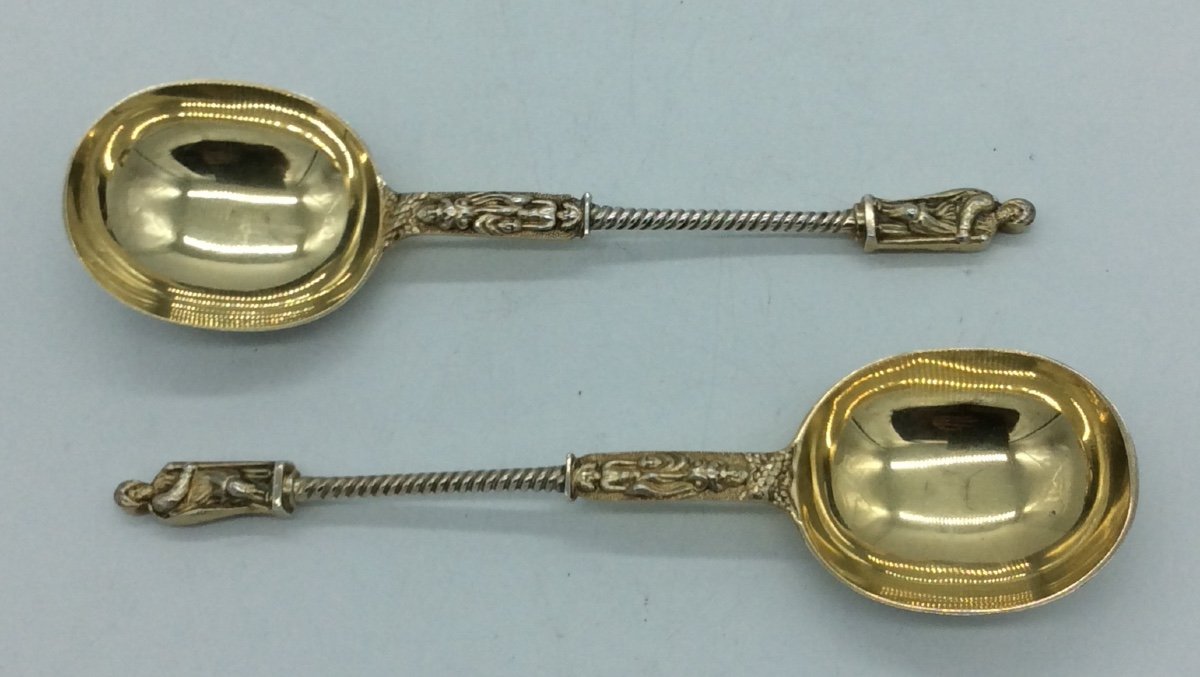 Pair Of English Silver Spoons With Antique Decor, 20th Century.