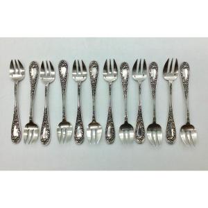 Series Of 12 Oyster Forks, Silver Minerva.