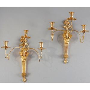 Paire d'appliques à tête de Putto aillé, attribuée à Claude Galle