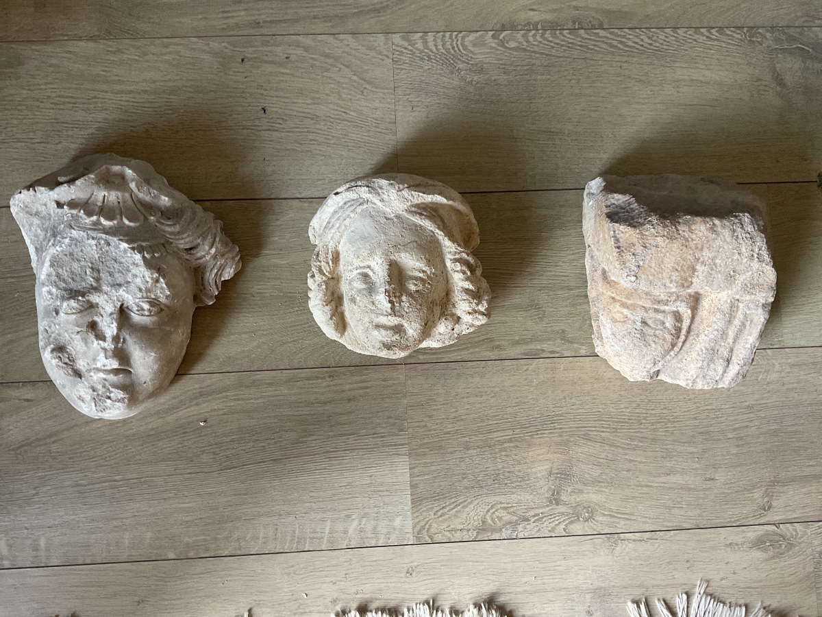 Three Sculpted Heads In Limestone