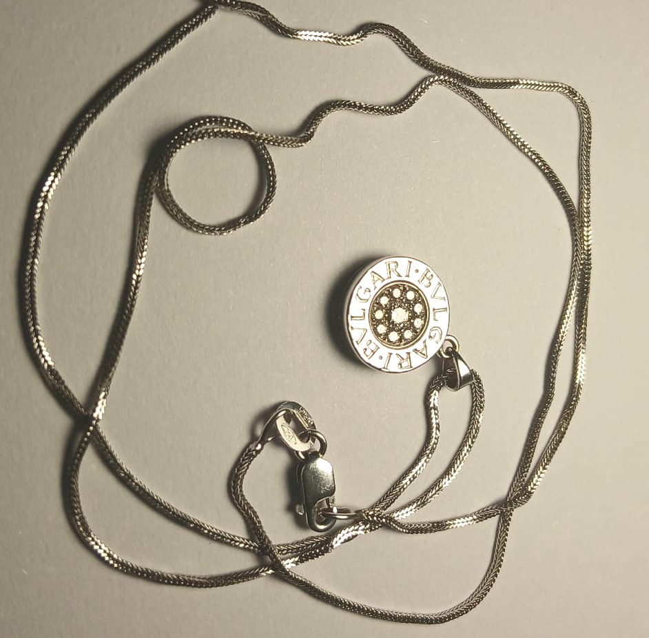 Bulgari - 1) Pendant Kt. 0.16 (and Necklace) - And - Bulgari -2) Earrings In Gold And Onyx. 