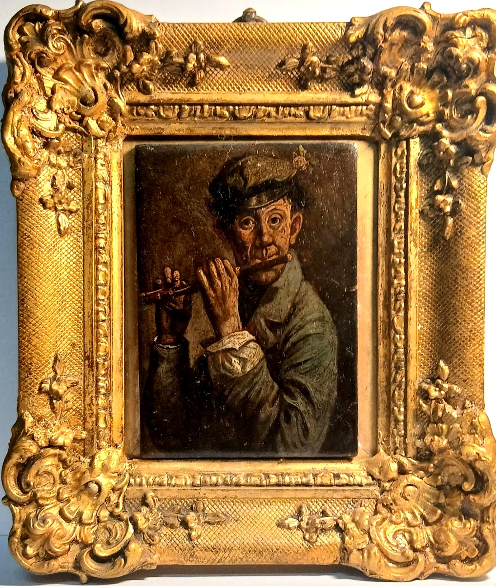 The Flute Player With A Flower On His Hat. Oil On Panel, 19th-century English School.