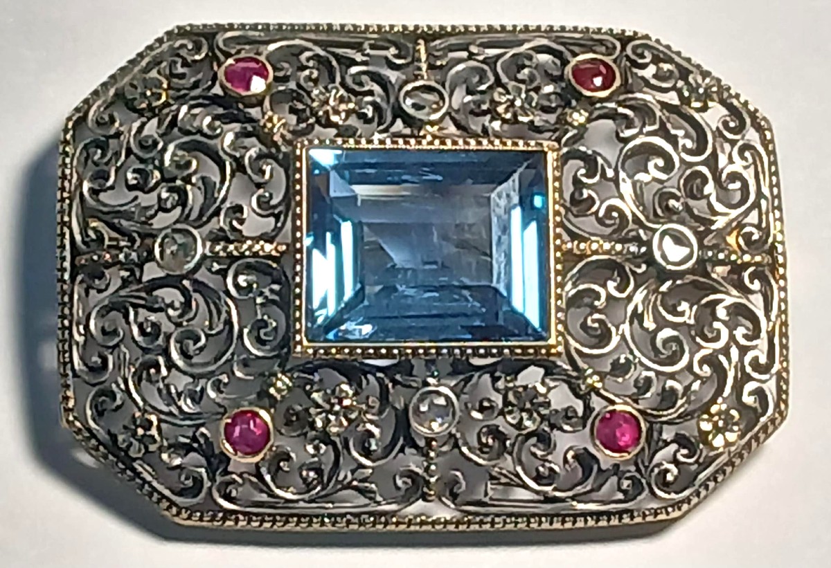 A Gold And Cupella Lace-style Brooch With Blue Topaz, Diamonds, And Rubies. Liberty Style.