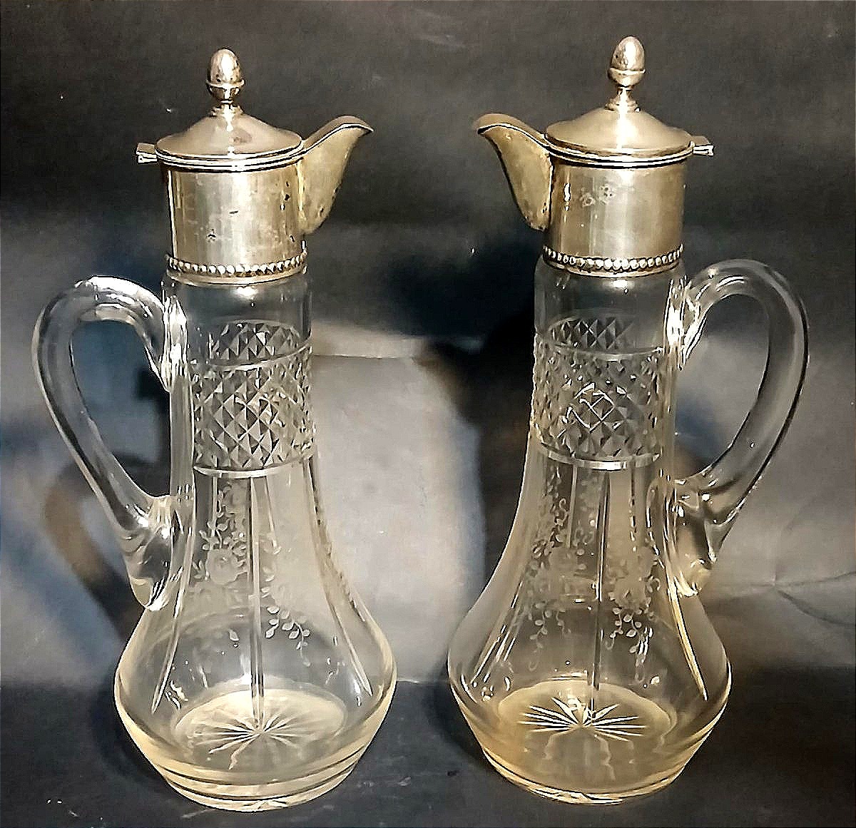 Pair Of Crystal Pourers Engraved And Decorated With Floral Motifs And Silver Structure.