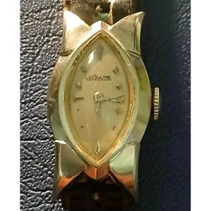  Montre-bracelet femme Le Coultre Art Déco, modèle 'flèche', en or blanc 14 carats.