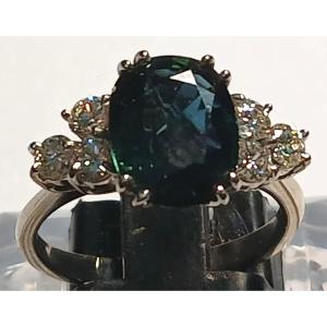 White Gold Ring With A Sapphire Of Approximately 1.70 Kt And Six Diamonds Of Approximately 0.80