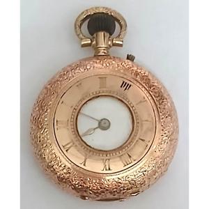  Montre suisse pour femme, ciselée en or 12 carats - « œil de bœuf » - en état de marche.