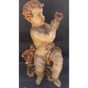 Lacquered And Gilded Wooden Cherub. Genoa, 17th Century, 66 Cm On A Gilded Louis XVI Base.