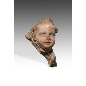 Sculpteur romain du XVIIe siècle Tête de putto en terre cuite