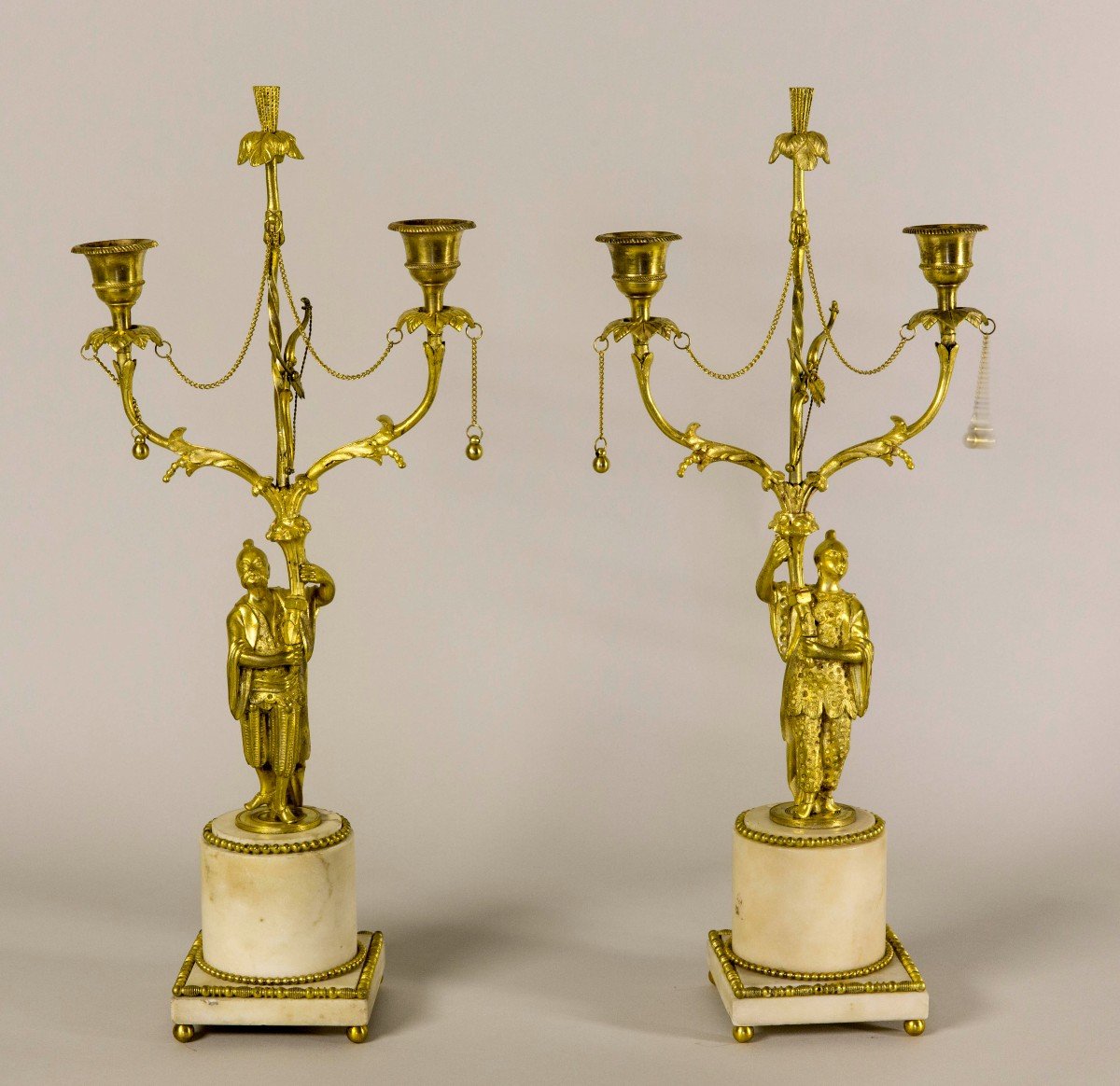 Pair Of Louis XVI Period Candlesticks In Gilt Bronze