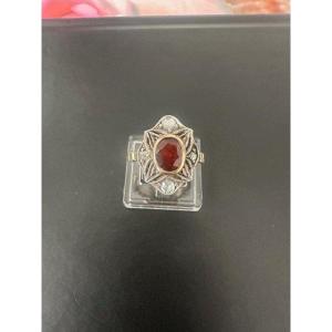 Ring With Garnet And 4 Diamonds