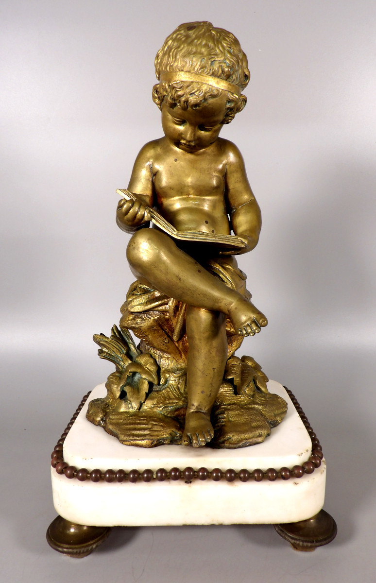 Bronze With A Gilt Patina On A White Marble Base - Studying Child