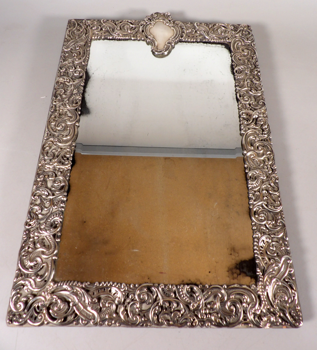 Large Victorian Style Mirror With Openwork And Repoussé Silver Frame