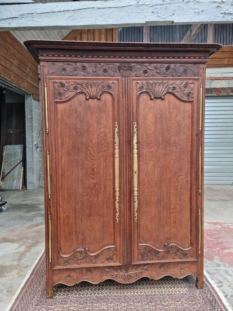Louis XIV Style Carved Molded Oak Wardrobe From The 19th Century. 
