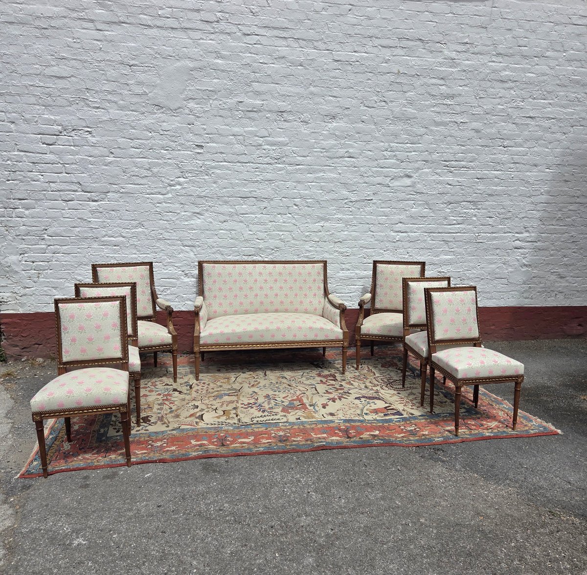 Partially Gilded Walnut Living Room Set. Sofa, Two Armchairs, And Four Chairs. Louis XVI, 19th Century 