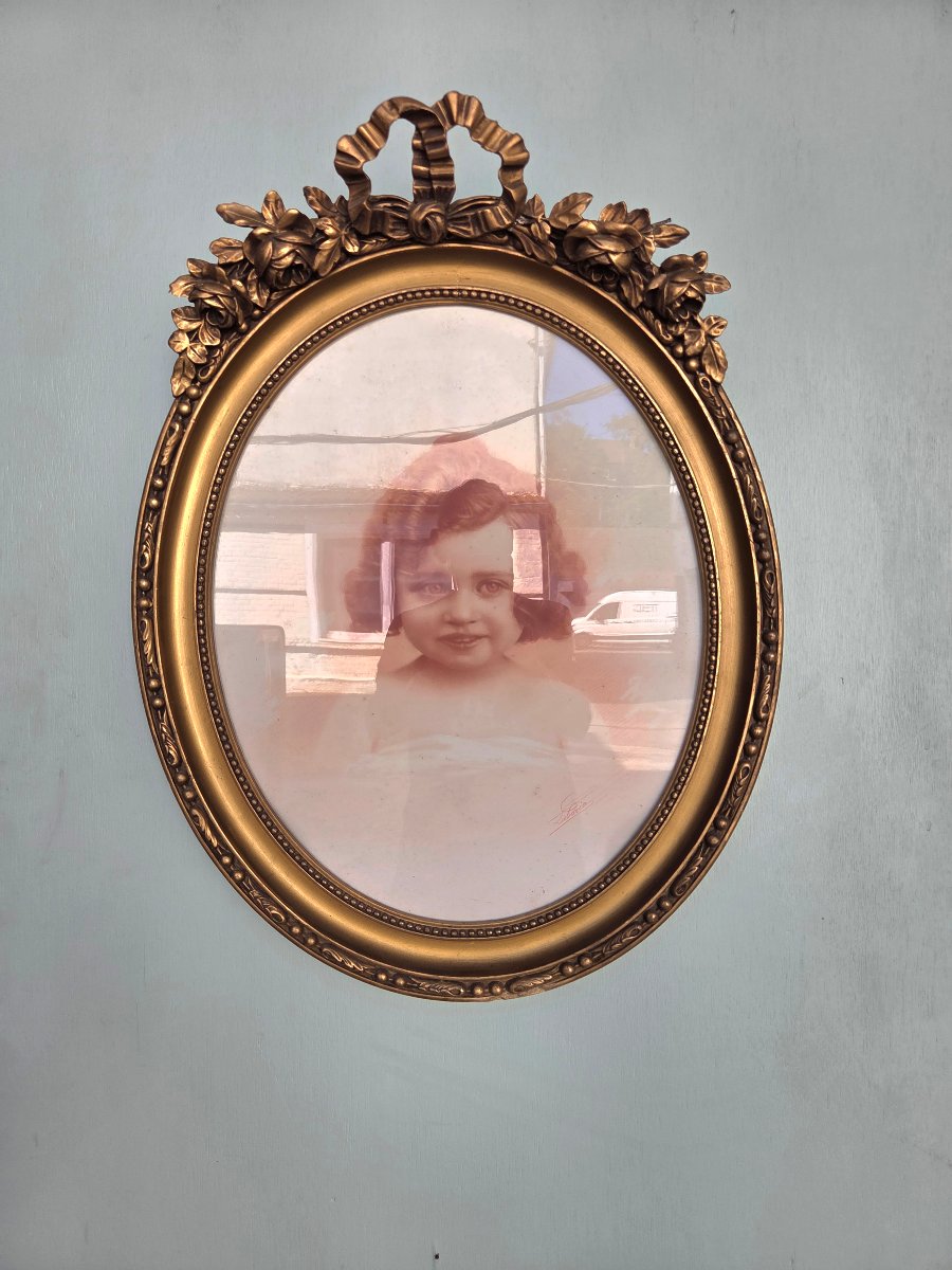 Miroir ovale en bois et stuc doré, style Louis XVI, d'époque XIXe siècle