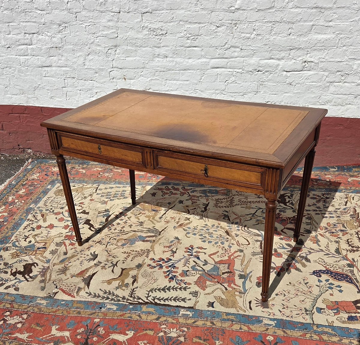 A Louis XVI-style Walnut Desk With Cognac-colored Leather, Dating From The 19th Century. 
