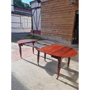 Table ronde en acajou, à rallonges, six pieds, Louis Philippe d'époque XIXème 