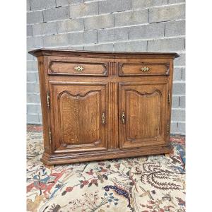Buffet bas en chêne, deux tiroirs, deux portes Louis XV , fin XVIIIe siècle