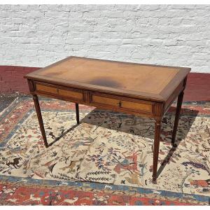 A Louis XVI-style Walnut Desk With Cognac-colored Leather, Dating From The 19th Century.