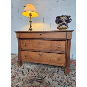Commode en chêne clair, à demi-colonnes cannelées.  Empire, d'époque  XIXème siècle